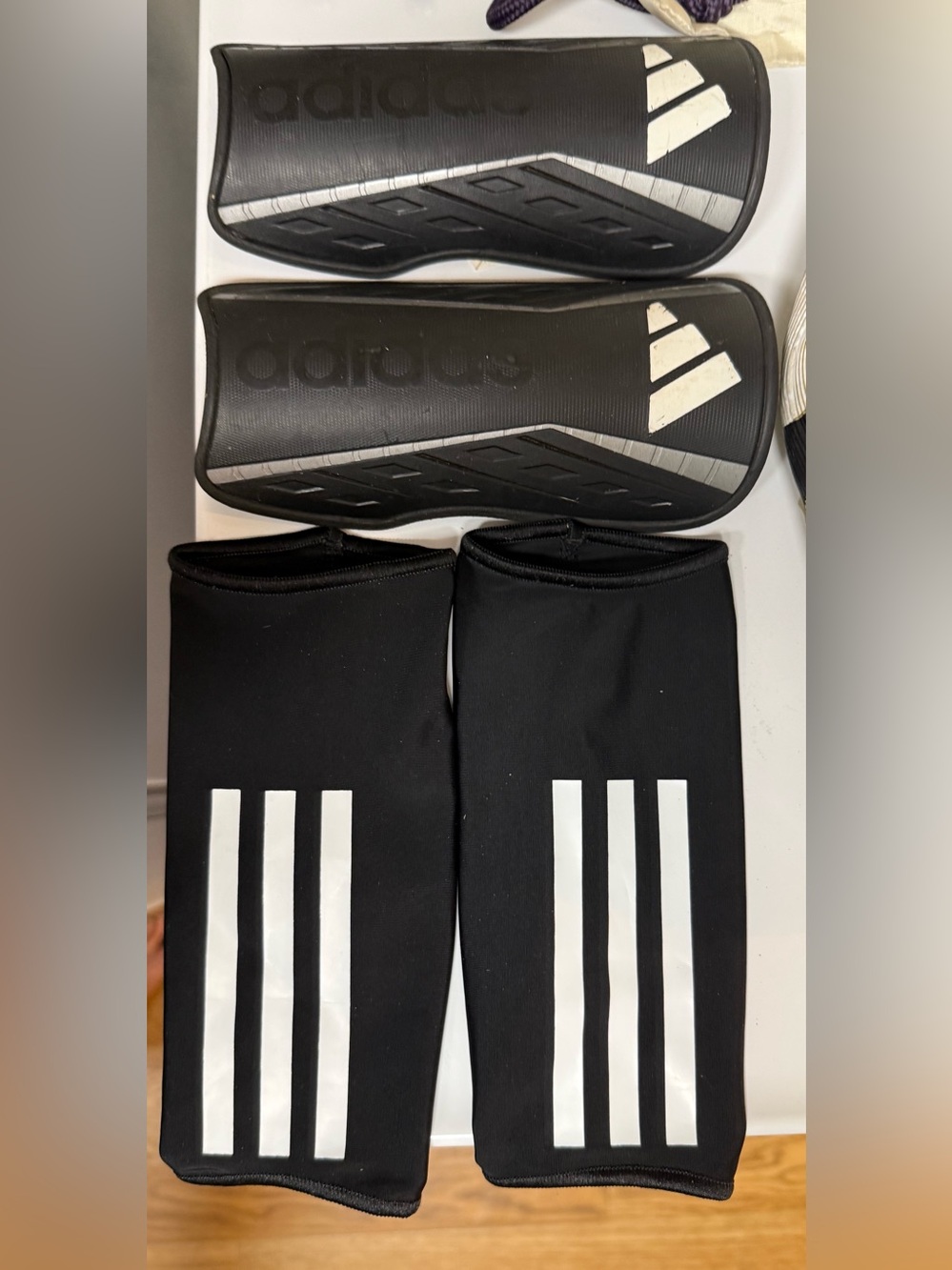 Soccer Shin Guards & shin guard sleeves, black with white adidas logo, unisex